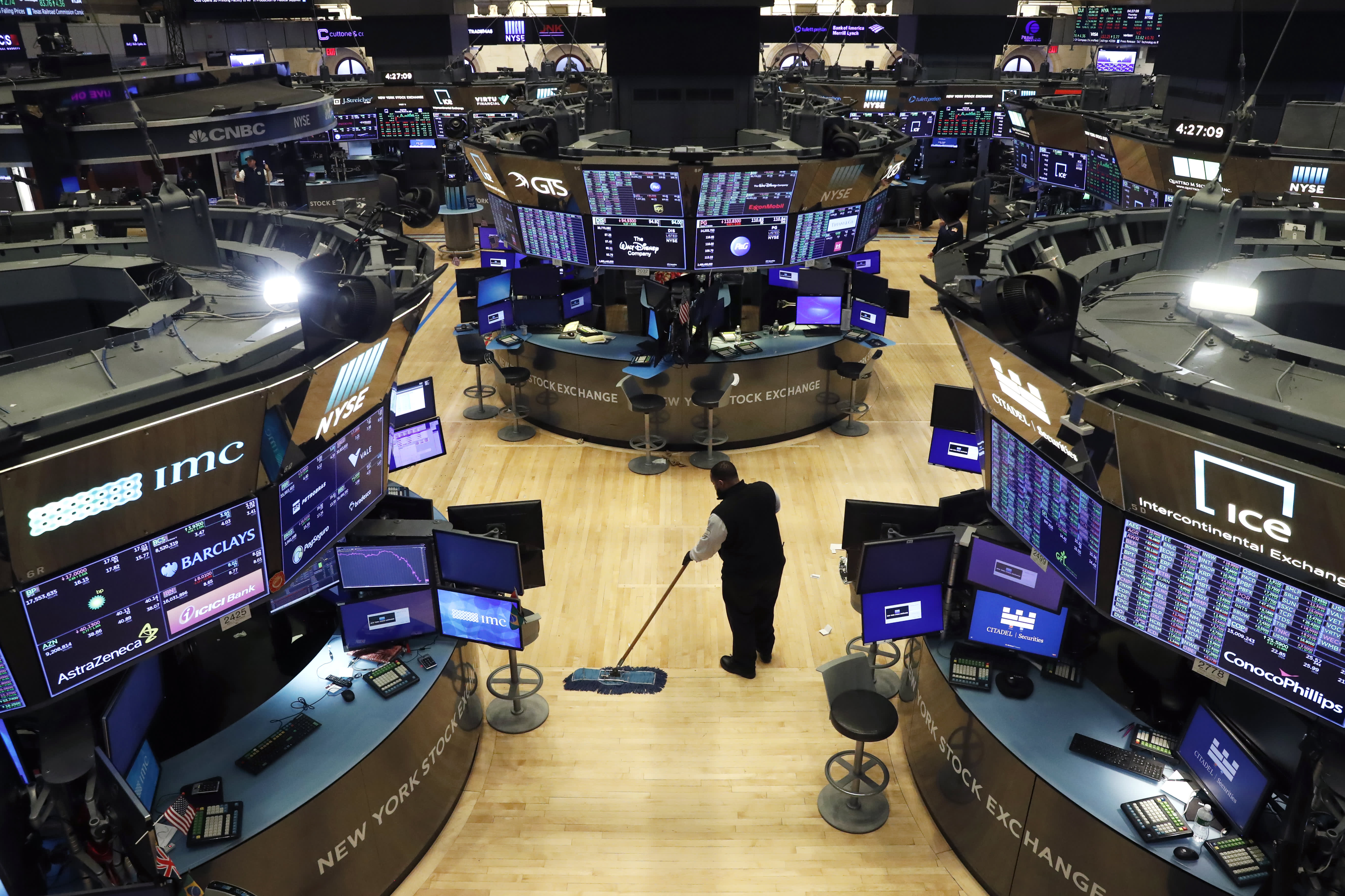 Wall Street trading floor with financial professionals at work